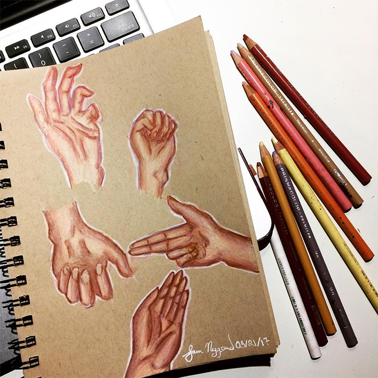 Drawings of hands on toned paper