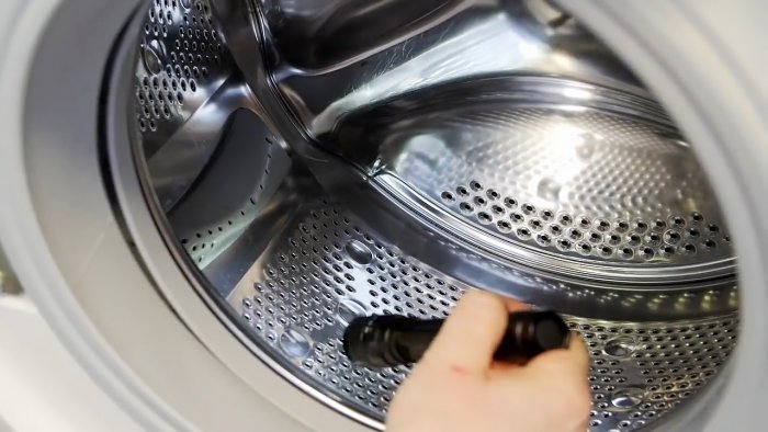 Как вытащить из стиральной машины мелкие предметы попавшие за барабан